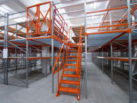 Stairs up a custom mezzanine in a warehouse