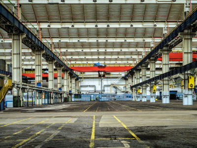 Loading dock full of material handling equipment to help with the loading and unloading of products