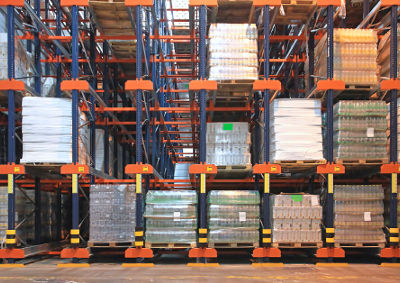 Rows of products on a rack system in a warehouse