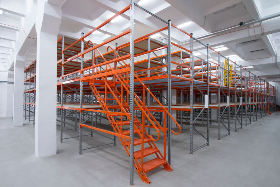 Stairs up a custom mezzanine in a warehouse